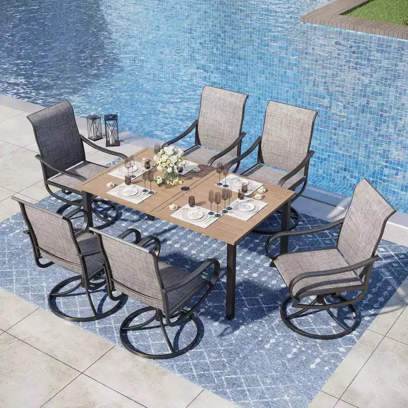 Set da pranzo rettangolare da esterno Captiva Designs, 7 pezzi, in acciaio, con foro per ombrellone e sedie girevoli in textilene