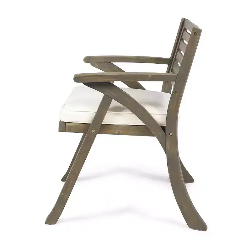 Set da pranzo Zhana per esterni in legno di acacia a 7 pezzi con cuscino di GDFStudio