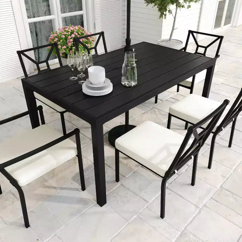 Set da pranzo da esterno Martha Stewart in acciaio da 7 pezzi con 6 sedie impilabili e tavolo da 62 pollici in nero