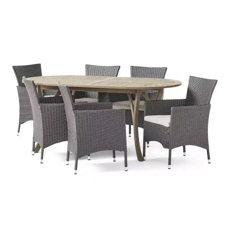 Set da pranzo a 7 pezzi Christopher Knight Home per esterno in legno di acacia e vimini con cuscini