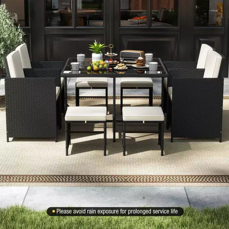 Costway Set da Pranzo per Esterni 9 Pezzi con Tavolo in Vetro Temperato e Pouf con Cuscini Rimovibili Bianco Sporco/Beige