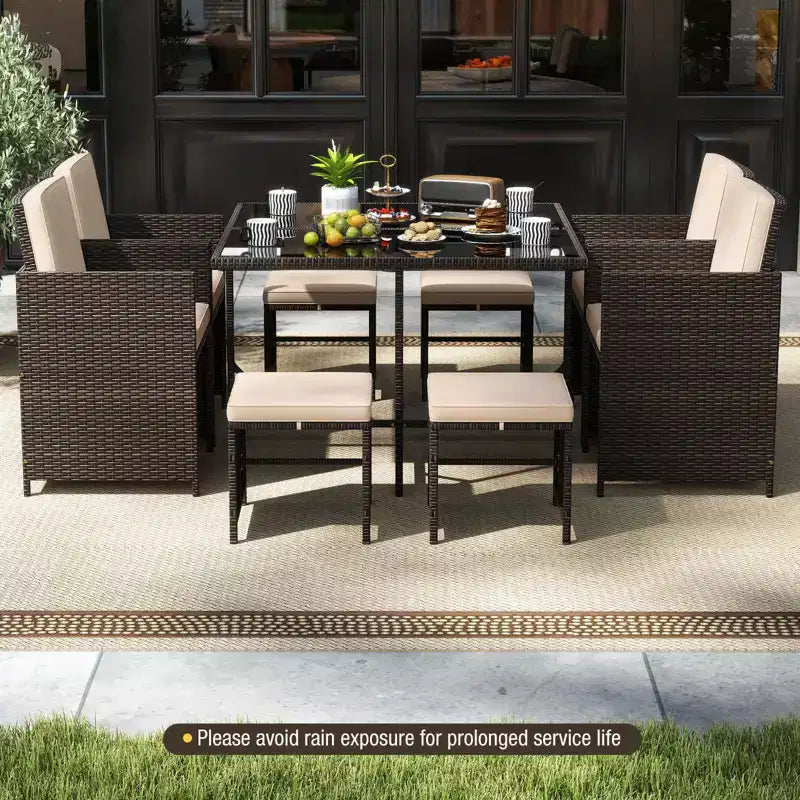 Costway Set da Pranzo per Esterni 9 Pezzi con Tavolo in Vetro Temperato e Pouf con Cuscini Rimovibili Bianco Sporco/Beige