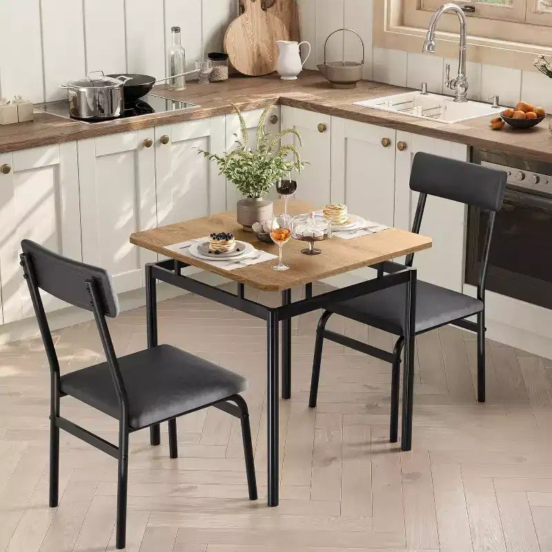 Set da pranzo 3 pezzi con tavolo e 2 sedie imbottite, struttura in legno, design salvaspazio, superficie facile da pulire, nero