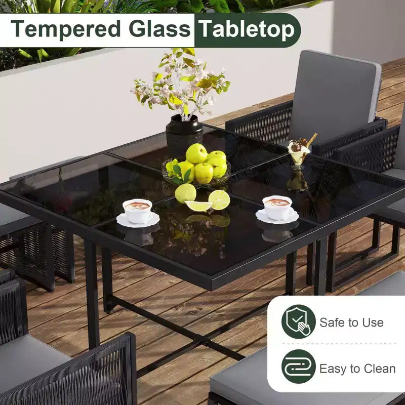 Costway Set da Pranzo da Giardino 9 Pezzi con Sedie in Rattan PE, Tavolo in Vetro Temperato e Pouf