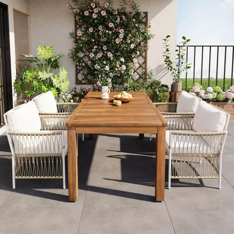 Set da pranzo Nicolas Patio di GDFStudio, 5 pezzi, in legno e metallo, con 4 poltrone in rattan intrecciato a mano