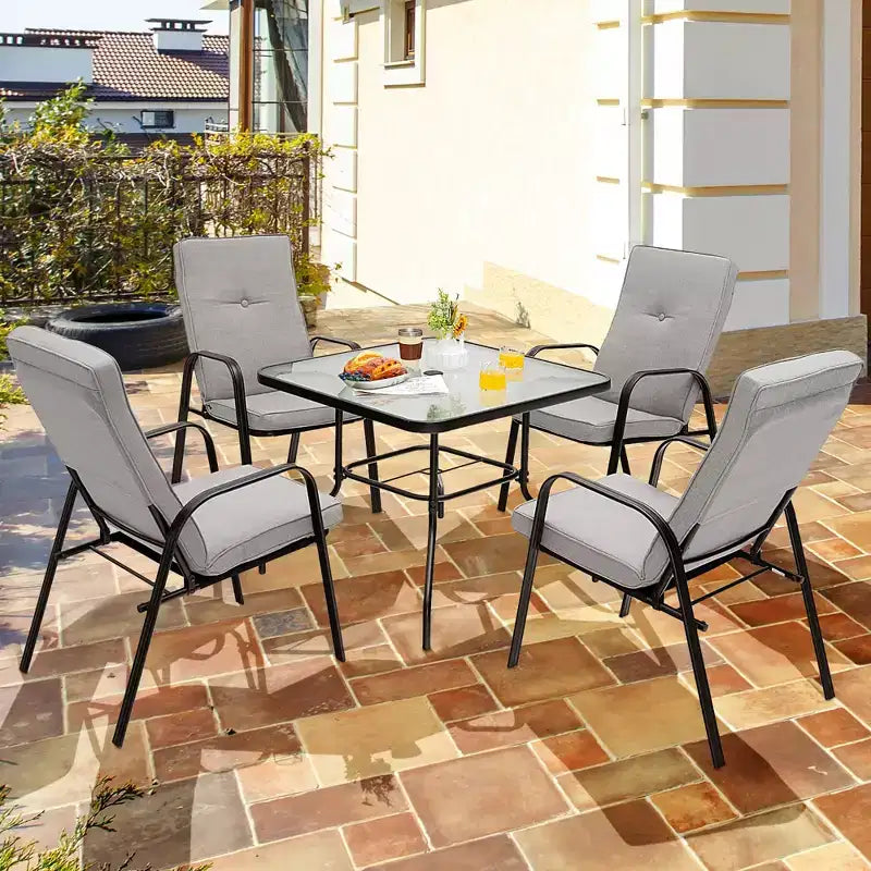 Set da pranzo per patio Costway 6 pezzi sedie impilabili ammortizzate tavolo in vetro con ombrellone